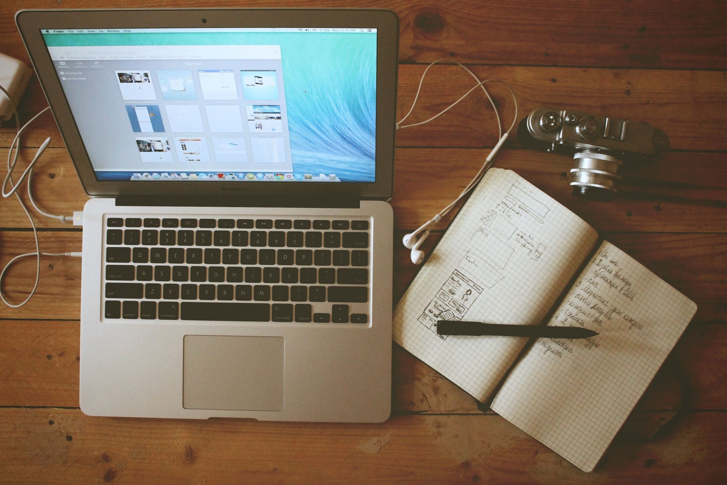 Laptop and idea notebook on a table