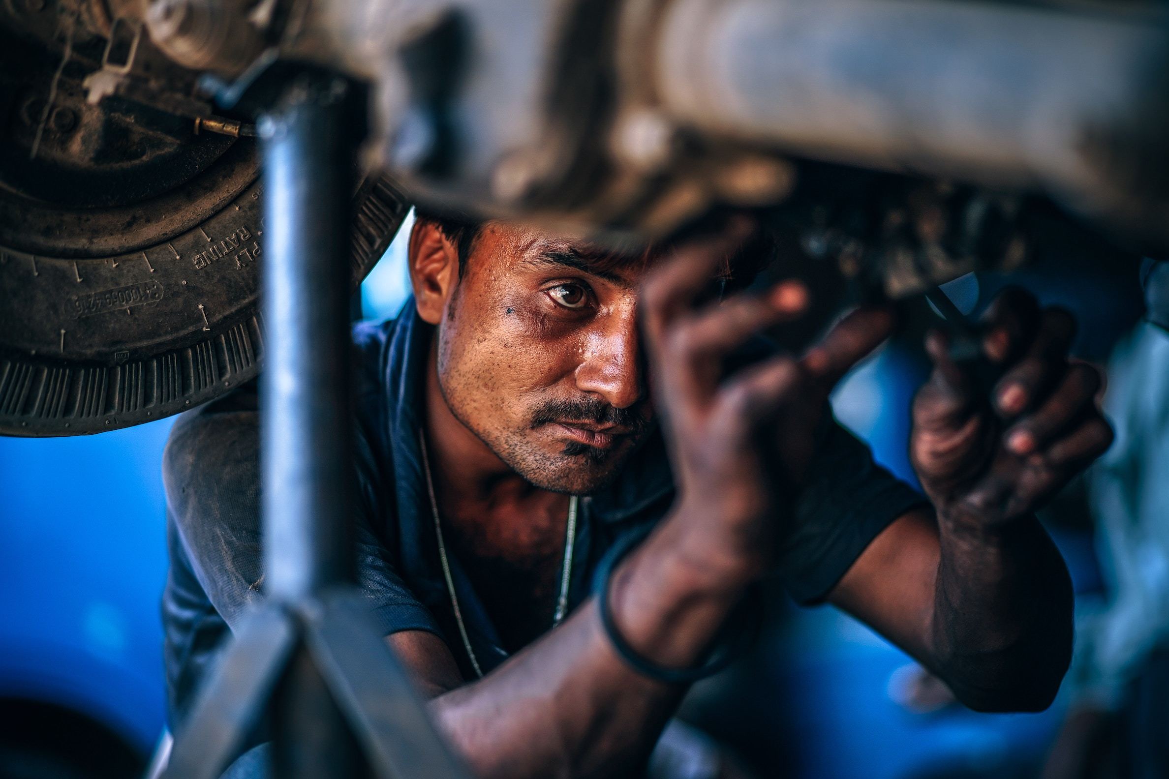 Mechanic working on car