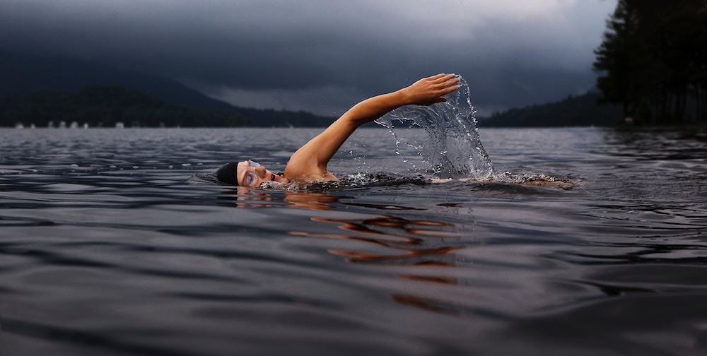 Swimmer in dark water
