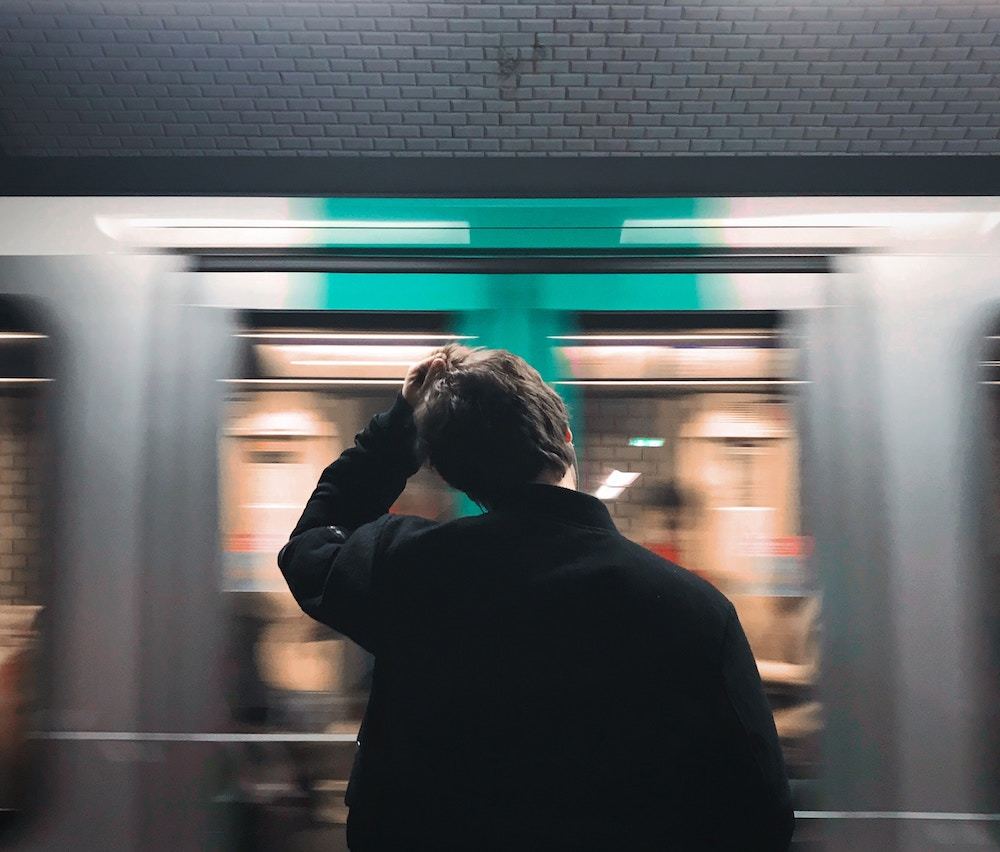 Person preparing to board public transportation