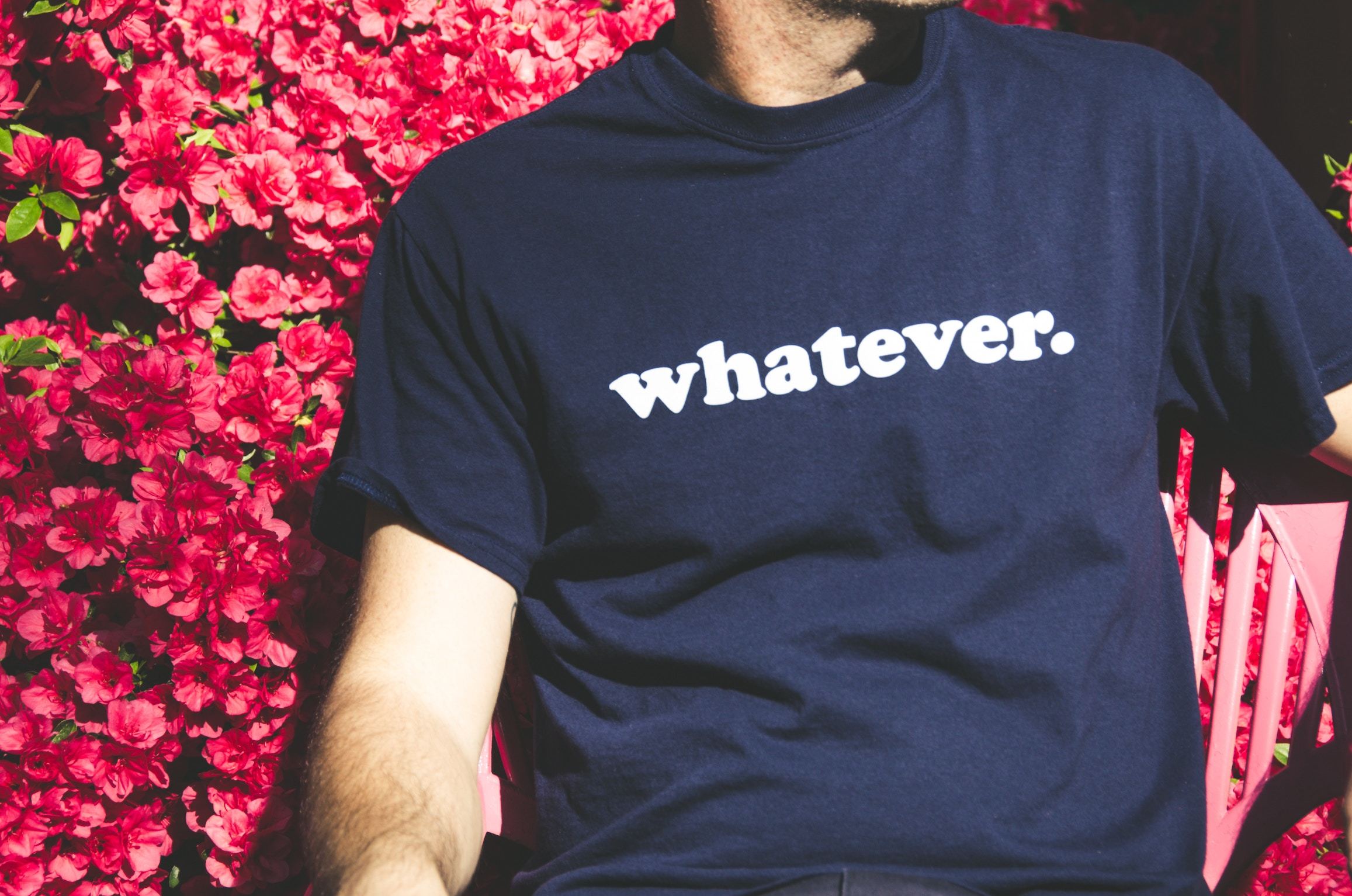 Man wearing tshirt that reads 