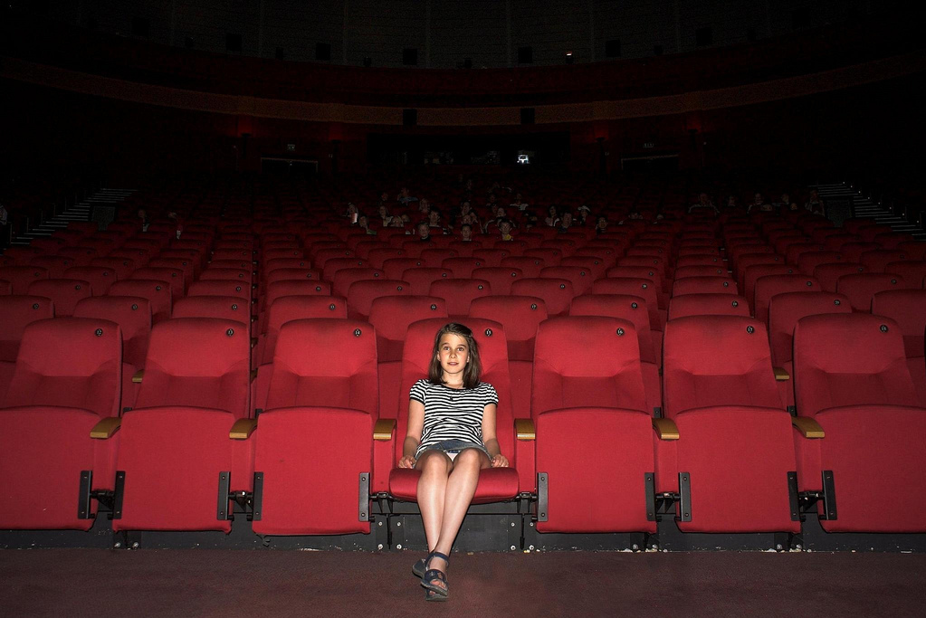 Girl in movie theater