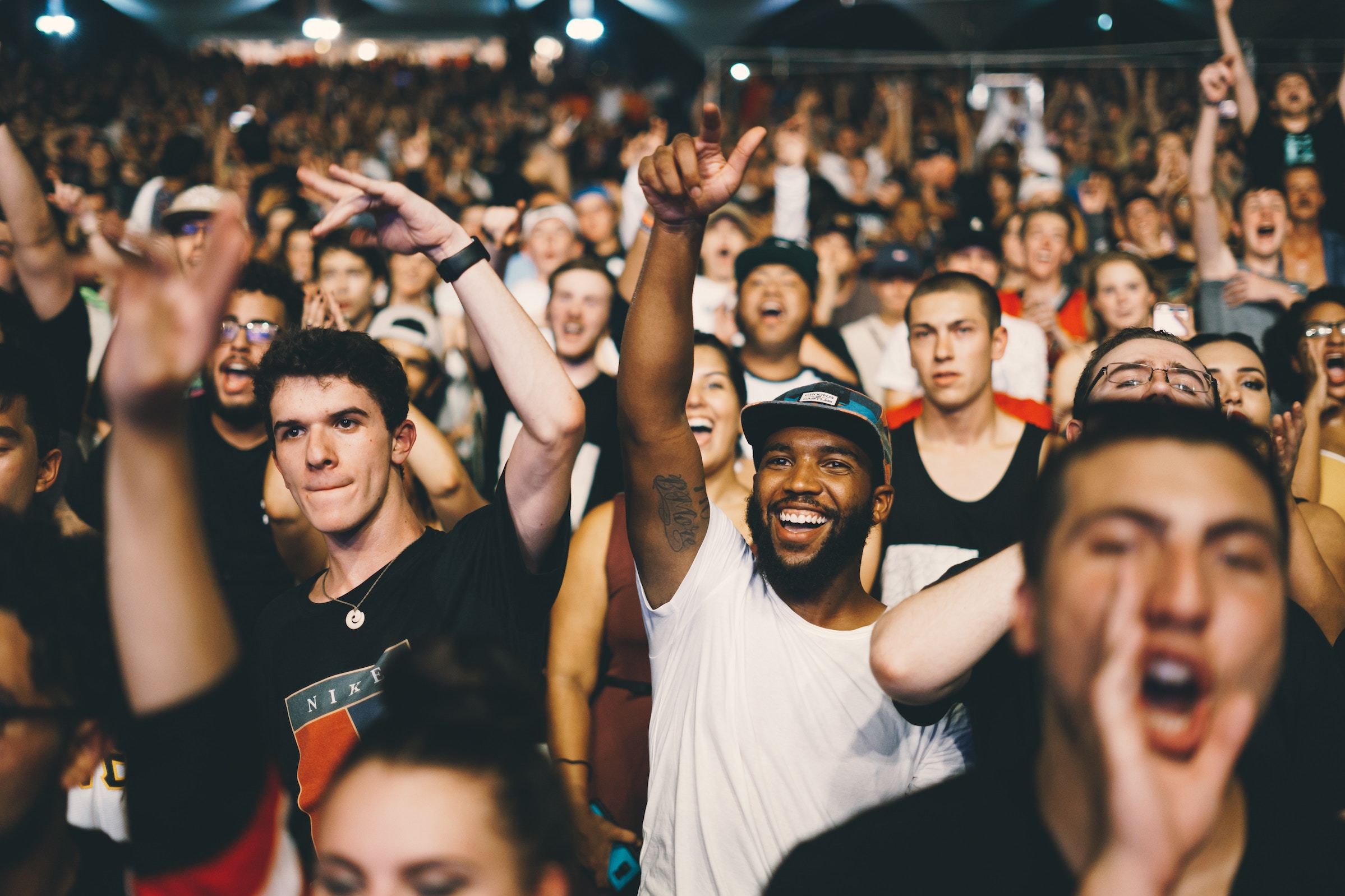 Crowd at an event, cheering