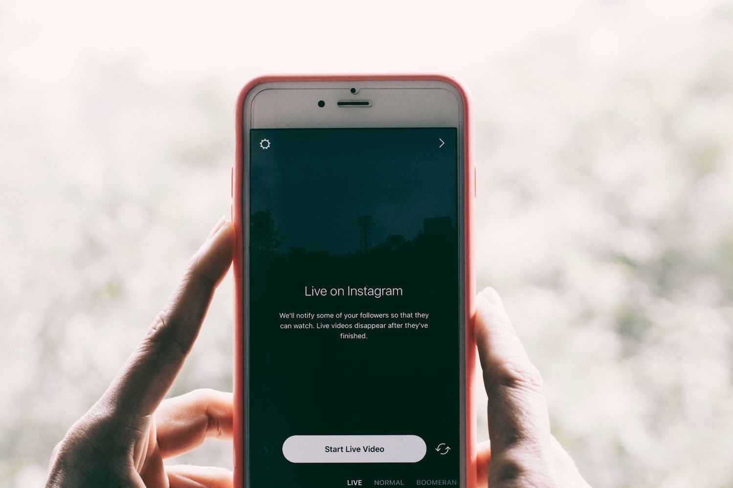 a smartphone with instagram live