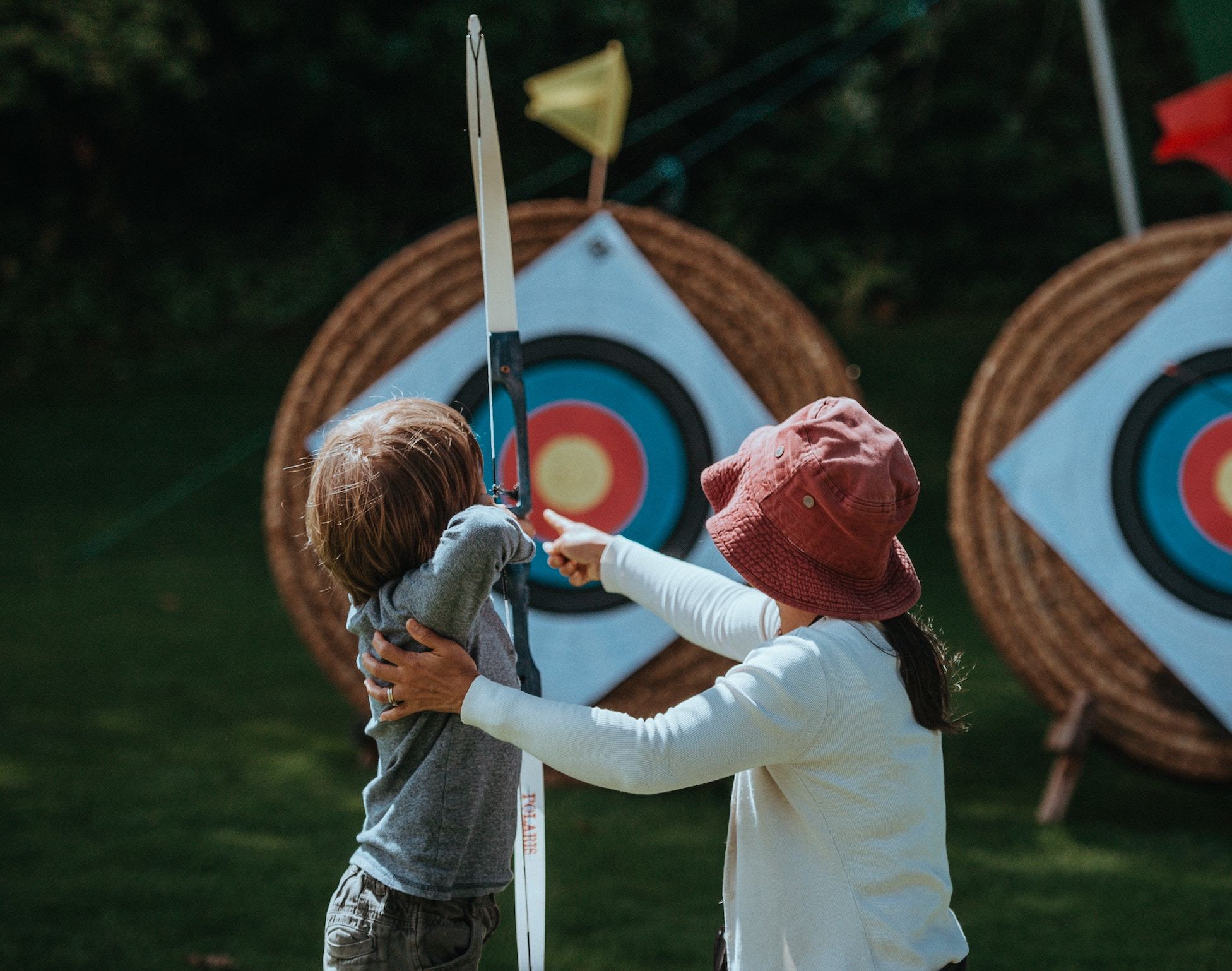 Boy learning archery