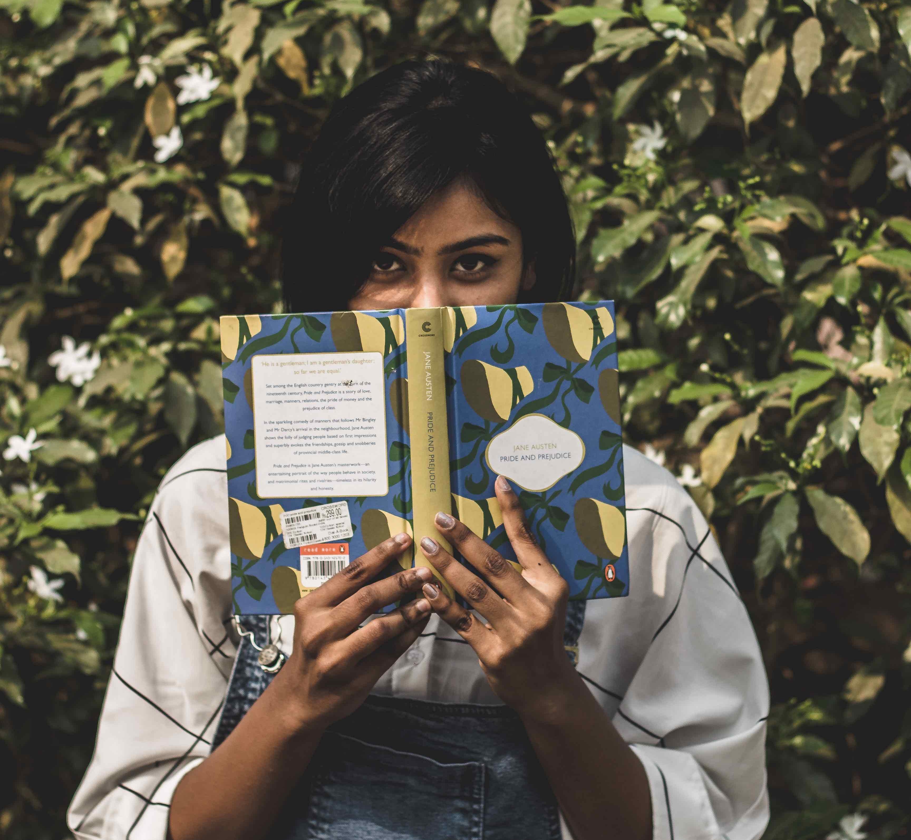 girl holding book