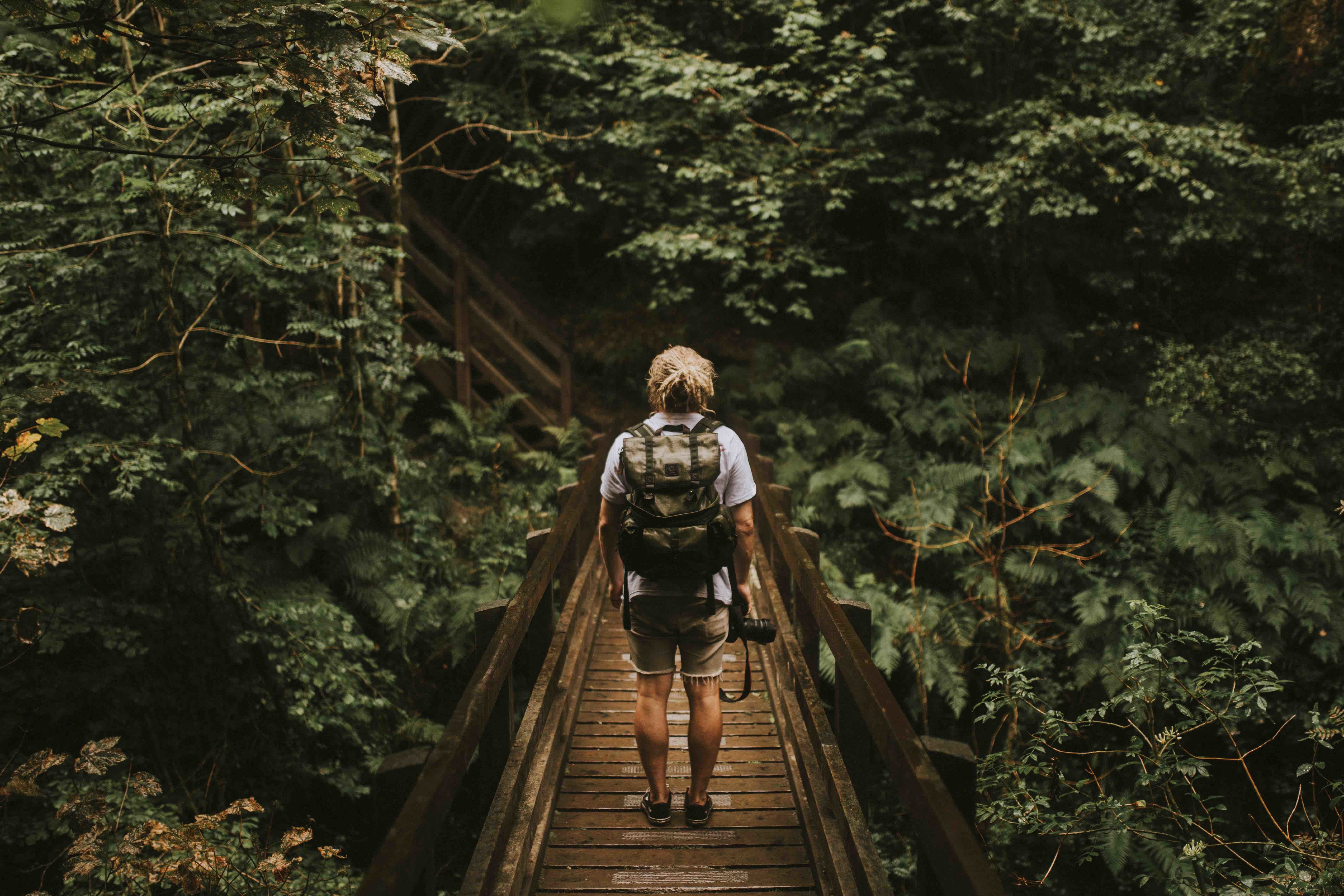 hiker on bridge