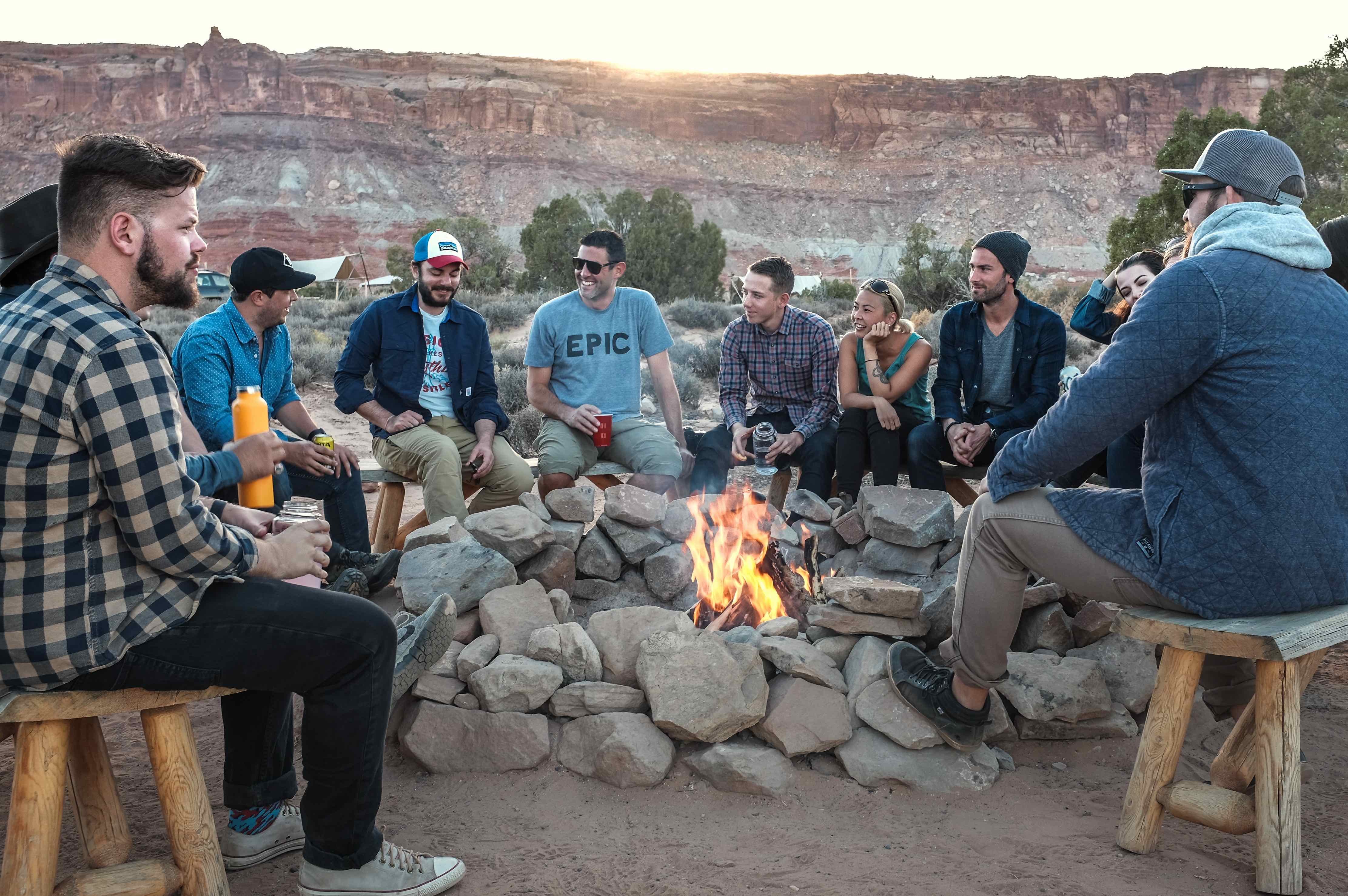 people gathered around a fire