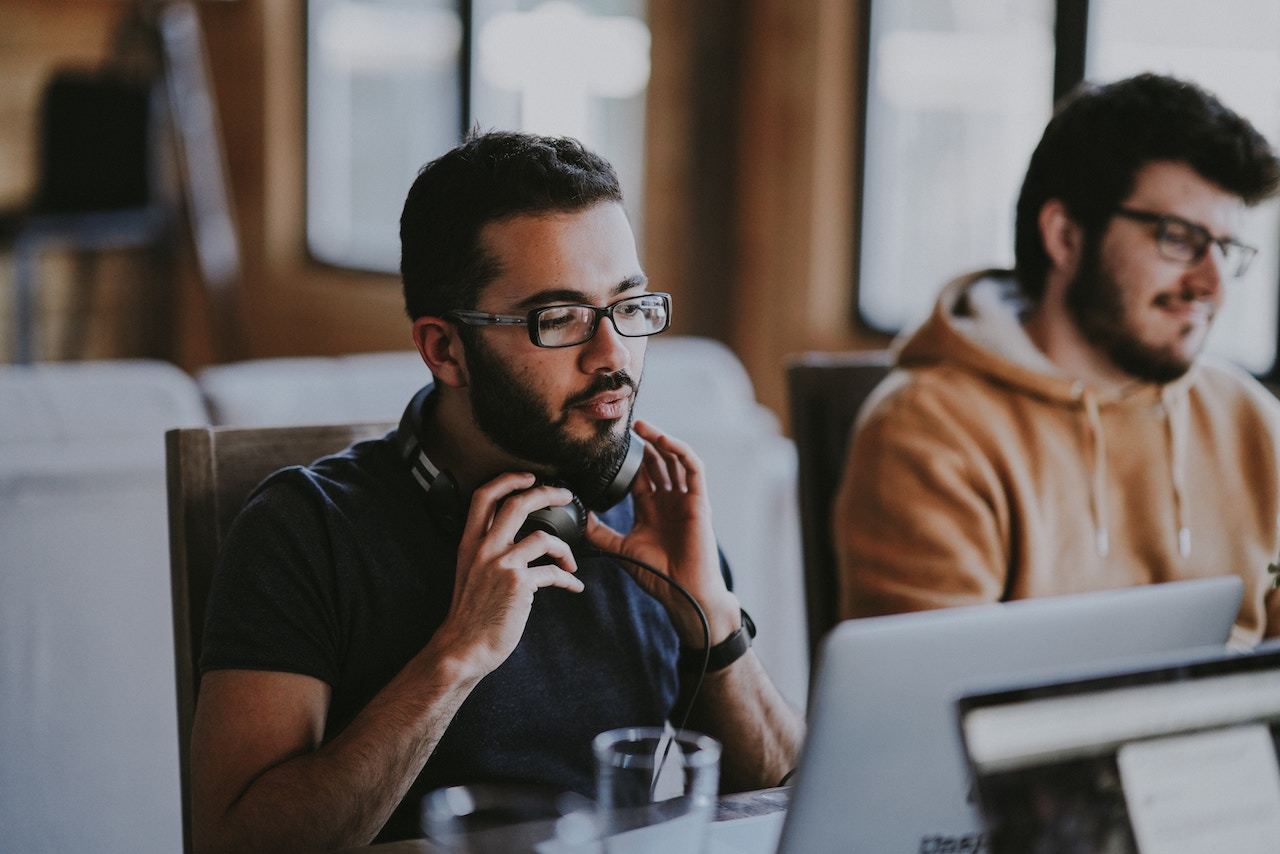 employee with headphones employer brand