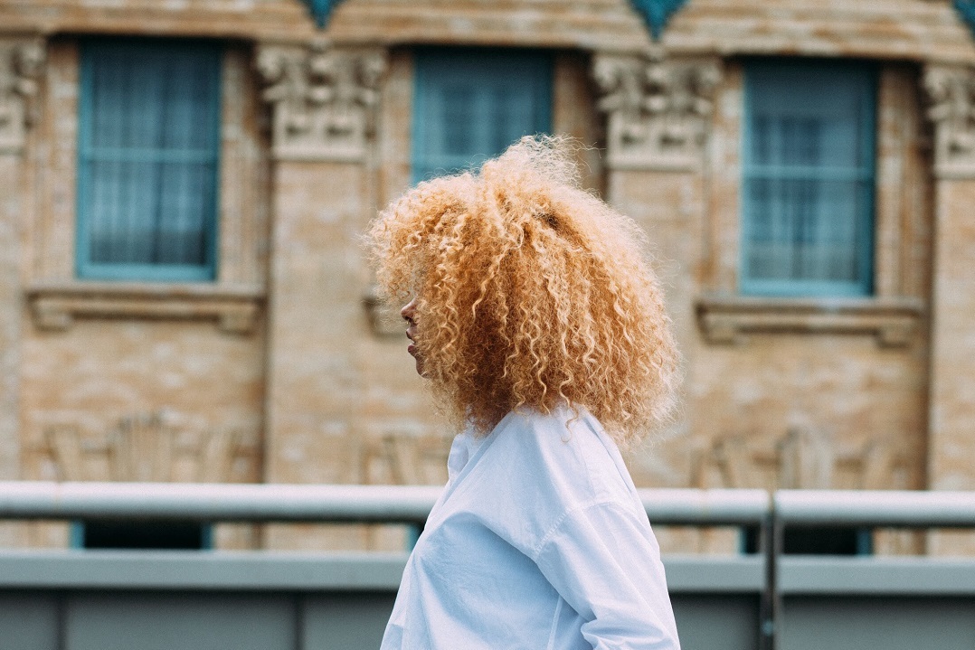 A millennial woman in profile