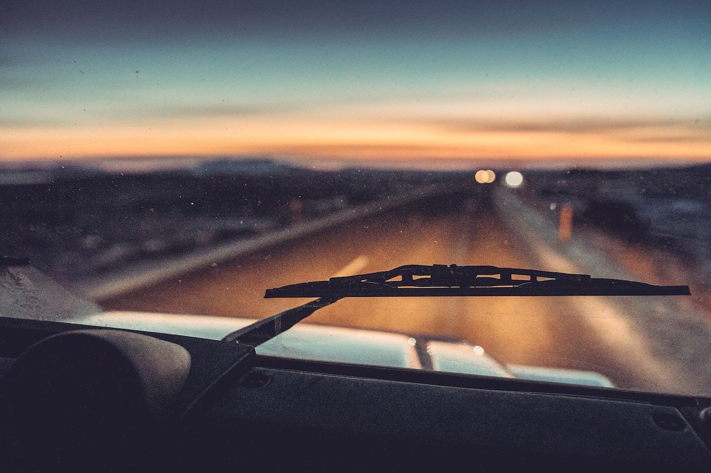 Icelandic sunrise through car windshield