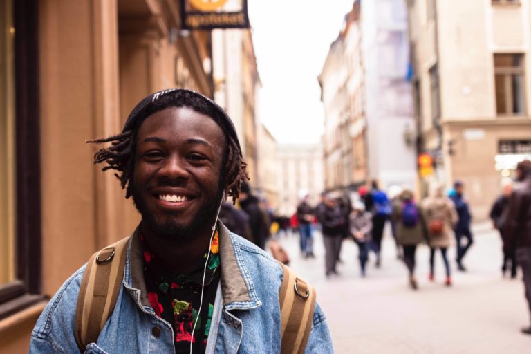 Man on the street with headphones