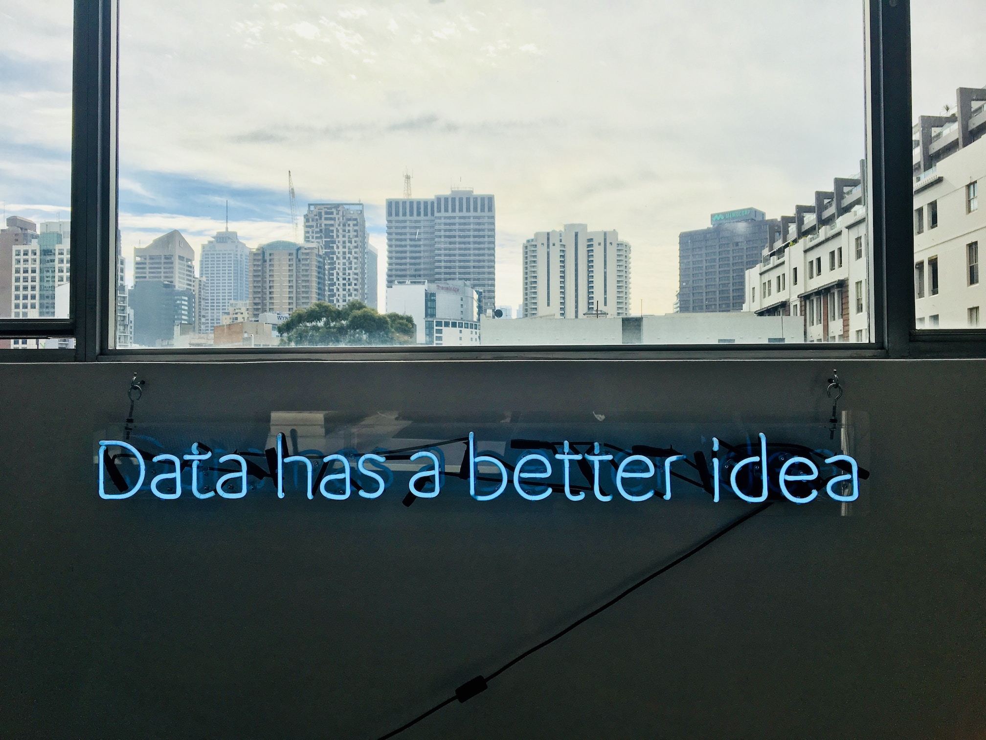 Neon sign in building, writing 