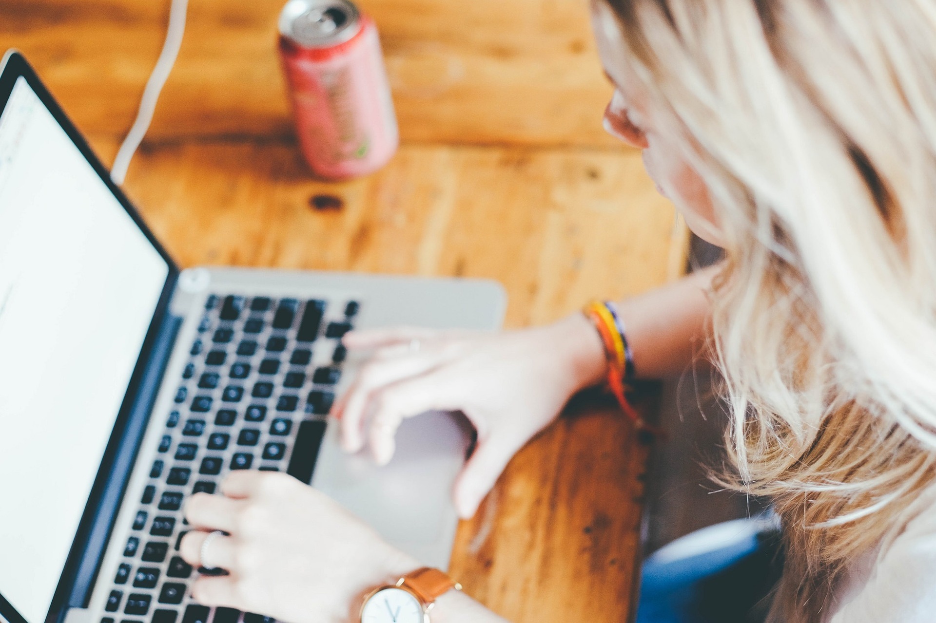 Woman typing on laptop