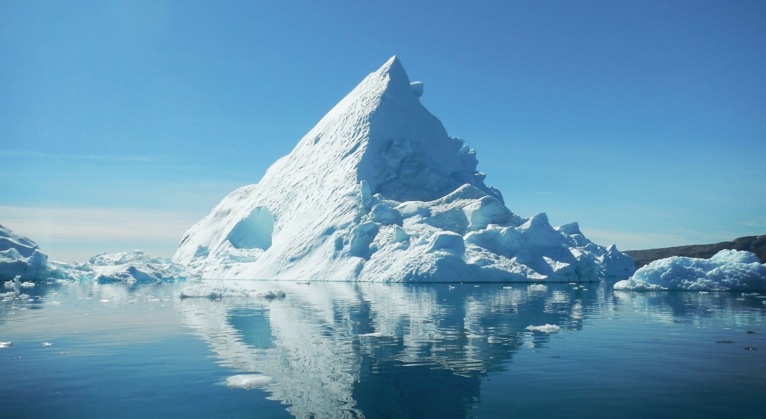 An iceberg in the ocean.